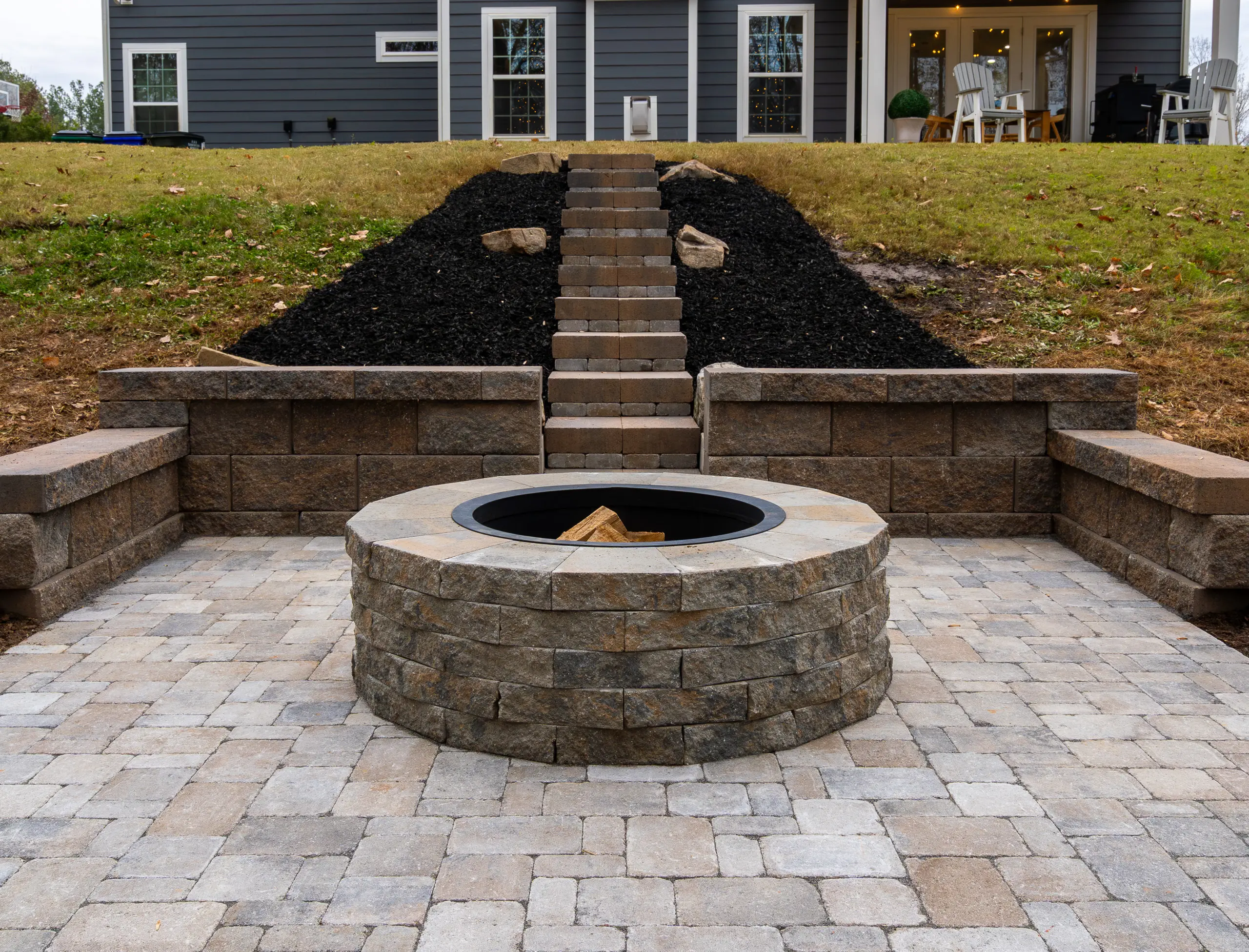 After wide view — paver patio firepit retaining wall Indian Land SC